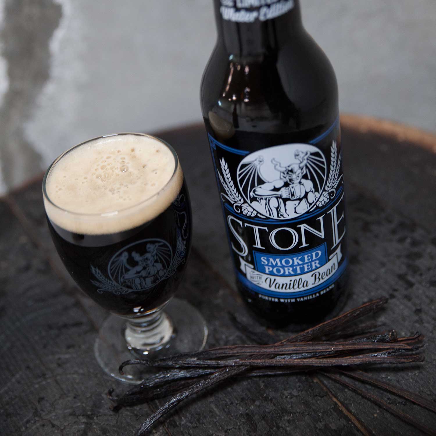 Glass and bottle of Stone Smoked Porter w/Vanilla Bean