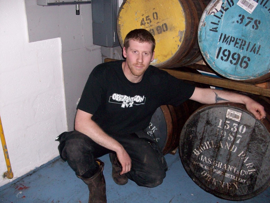 BrewDog's Stewart Bowman cozying up to a lovely cask of bashah maturing with tayberries  