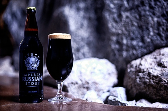 imperial russian stout beer in a glass and bottle