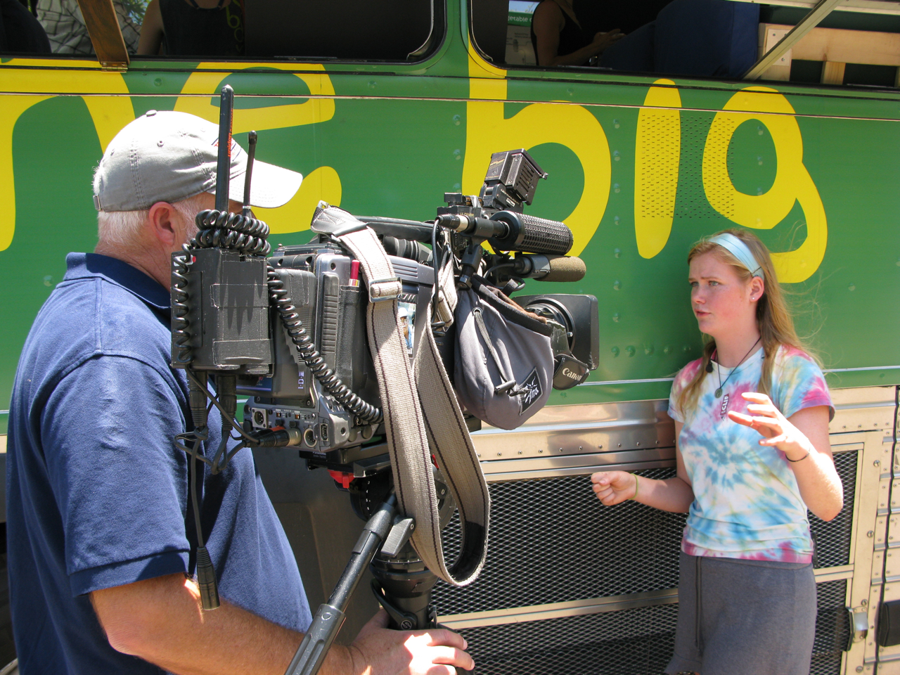 Anna, a Dartmouth sophomore from the Big Green Bus, being interviewed for the local news. The Big Green Bus is greeted by cameras wherever they go.