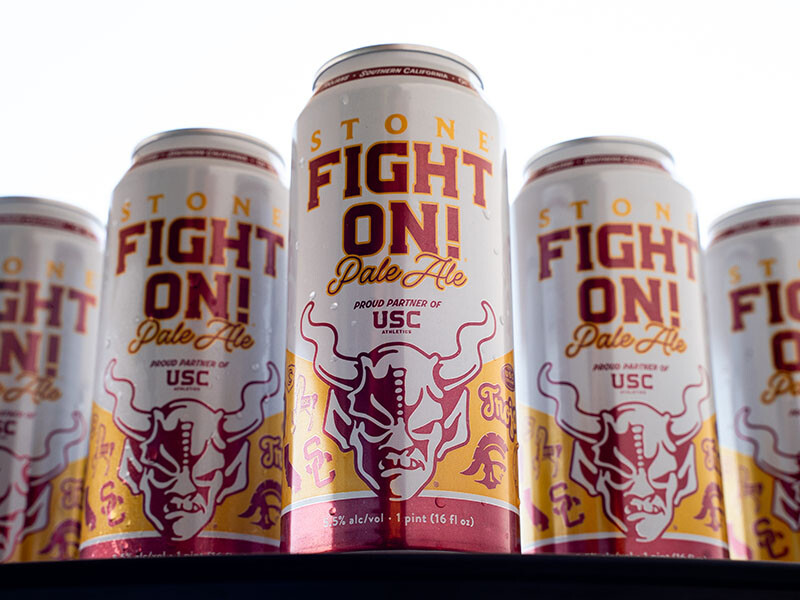 A lineup of the Stone fight on pale ale beer cans so they look like football players from USC