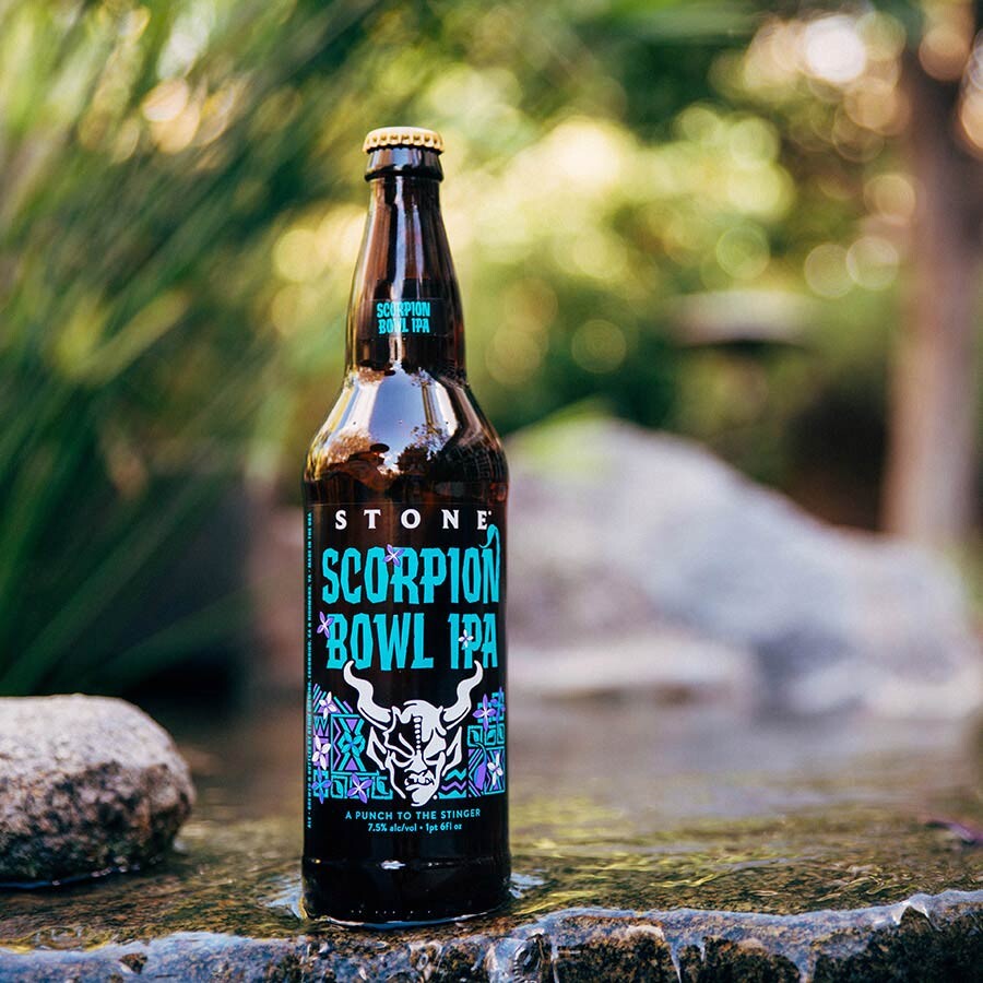bottle of Stone Scorpion Bowl IPA in the water