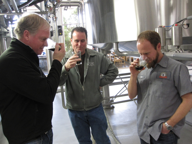 The brewers tasting the wort