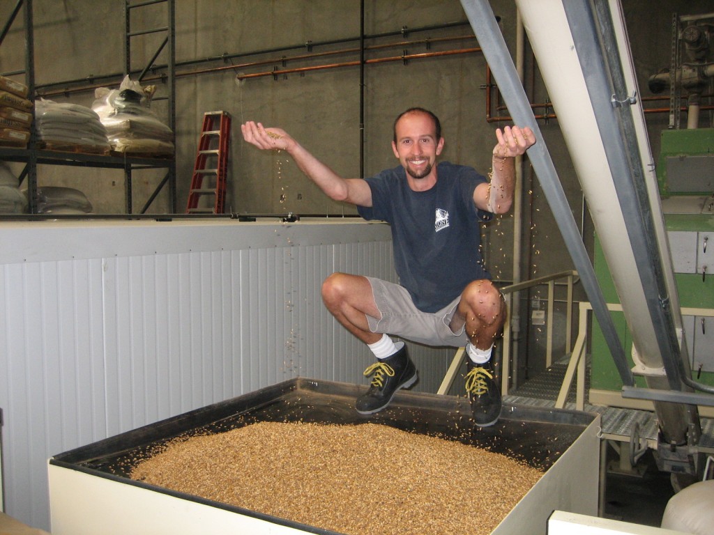 Our Brewhouse Supervisor, Jeremy Moynier, playing with malt