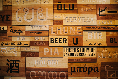 Wood plaques of beer in different languages