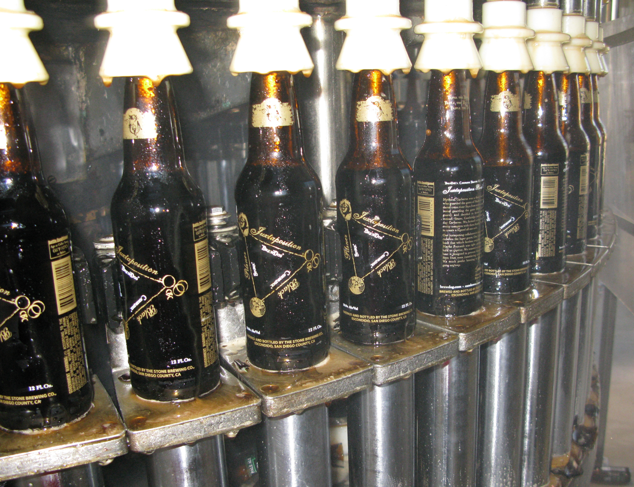 Bottles going through the filler. Look at that gold glisten...