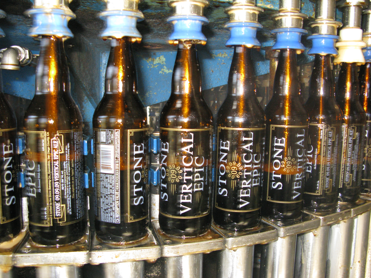 Bottles of Stone 09.09.09 Vertical Epic Ale going through the filler