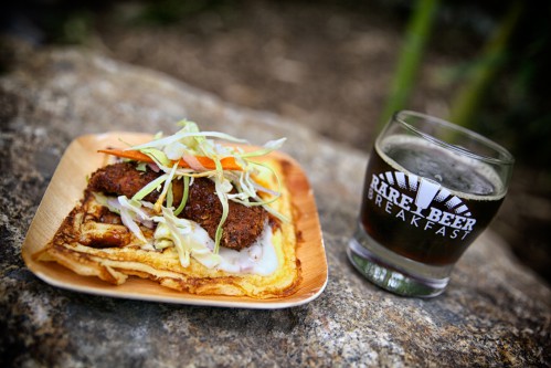 a plate of food and a full Rare Beer Breakfast glass