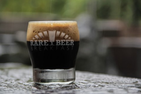Rare Beer Breakfast glass on a rock