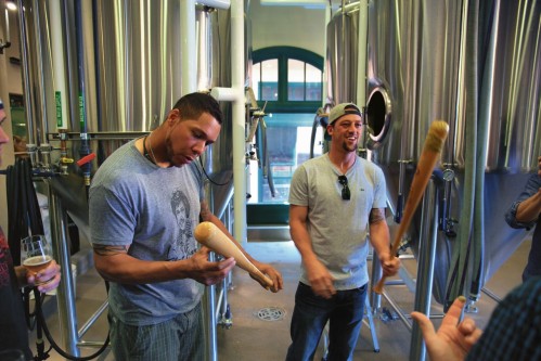 Kyle and Luke inspect the bats