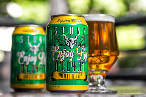 Stone Enjoy By 07.04.17 Unfiltered IPA cans and glass