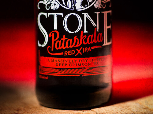 close-up on the bottom of a Stone Pataskala Red X IPA bottle