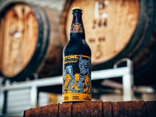 Drew Curtis / Wil Wheaton / Greg Koch Stone Farking Wheaton wootstout bottle in front of barrels