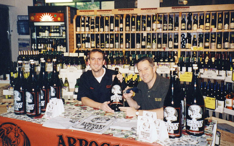 Greg and Steve showing off Arrogant Bastard