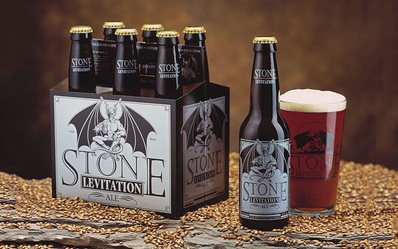 Stone levitation ale six-pack and glass