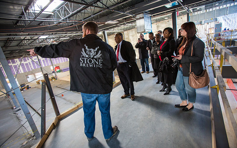 People touring brewery