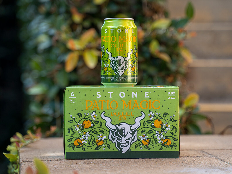 Stone Patio Magic Double IPA can and six-pack on a patio
