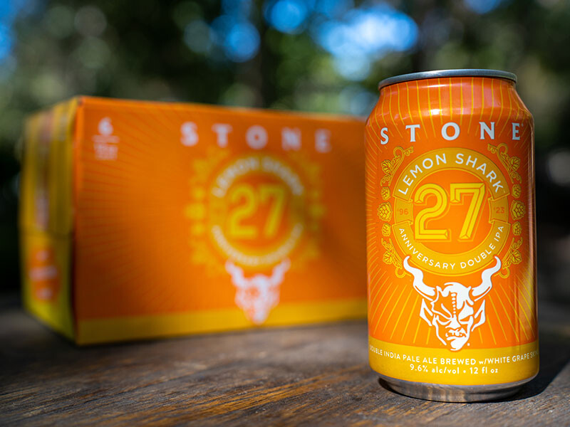 Can and six-pack of Stone 27th Anniversary Lemon Shark Double IPA