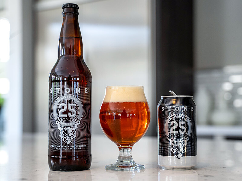 Stone 25th Anniversary Triple IPA bottle can and glass