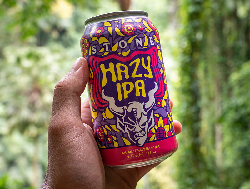 can of hazy ipa in front of jungle wall