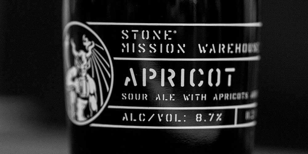 close-up on the Stone Mission Warehouse Sour - Apricot label