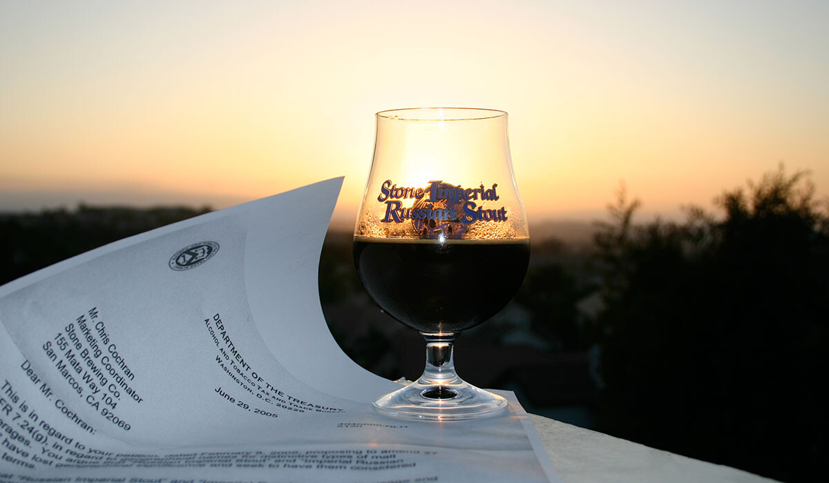 Imperial Russian Stout in front of the sunset