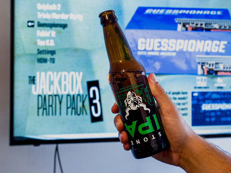Stone IPA In front of jackbox party pack 3