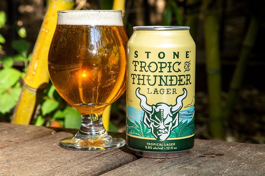 Tropic of Thunder can and glass