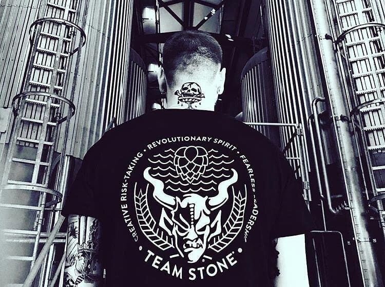 Team Stone member in tshirt with tattoo