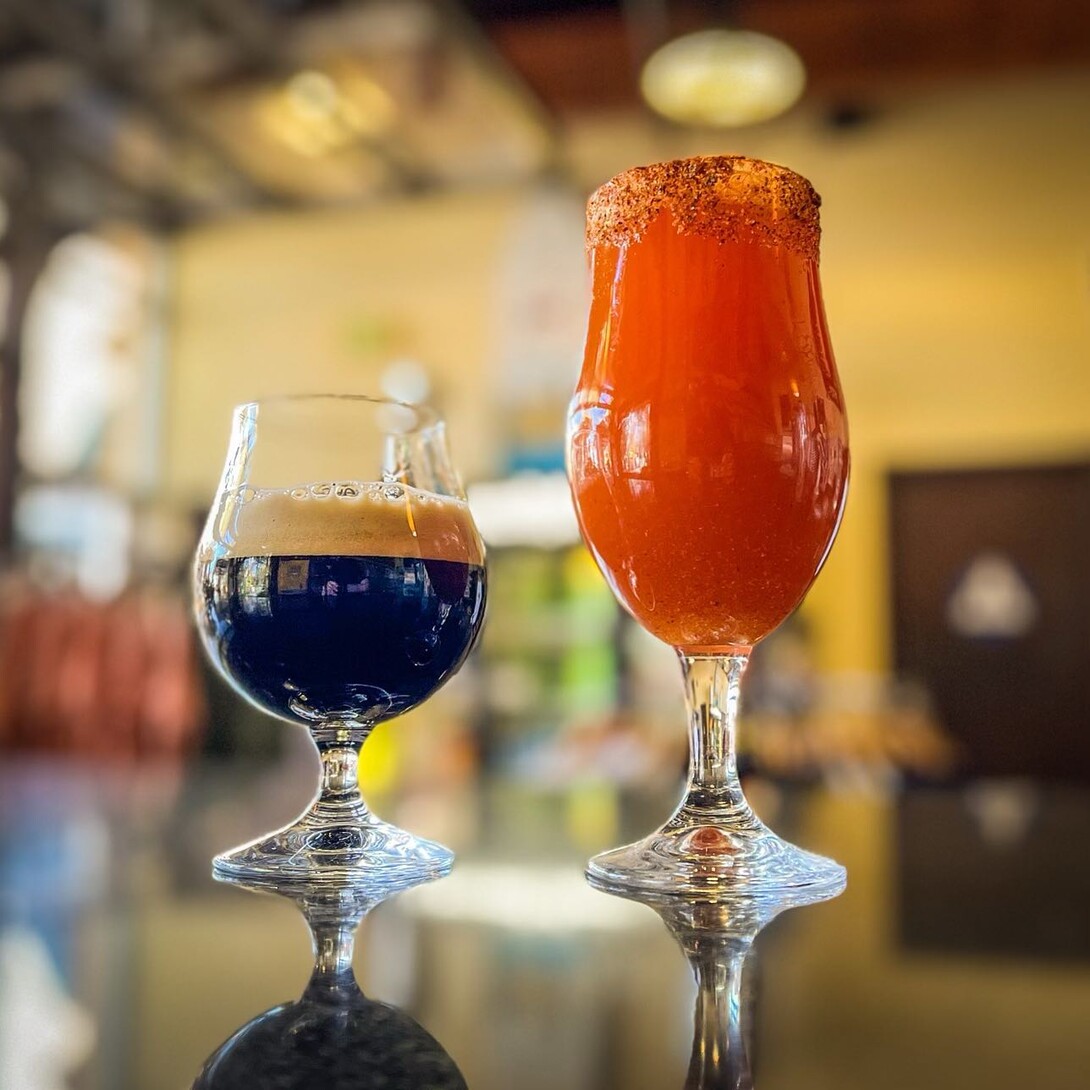 shot of a beer and a michelada on the bar at the stone brewing tap room oceanside